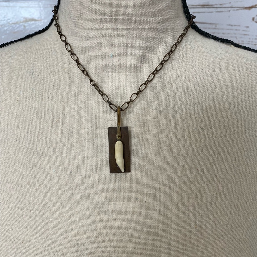 One of the kind necklace bobcat tooth